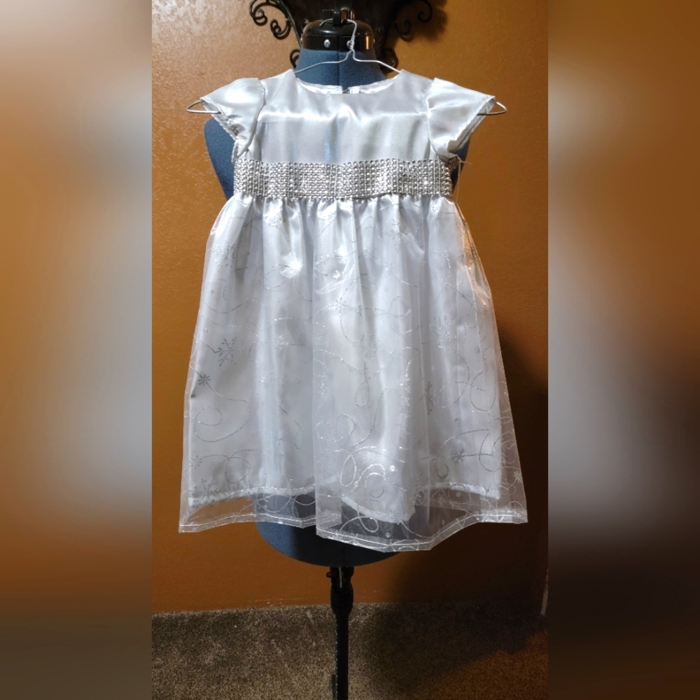 Custom-made/hand-sewn silver snowflake baby dress